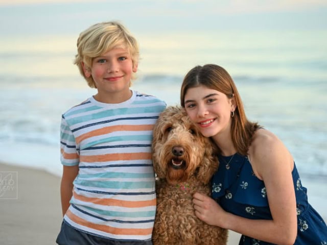 Brother and sister with dog.